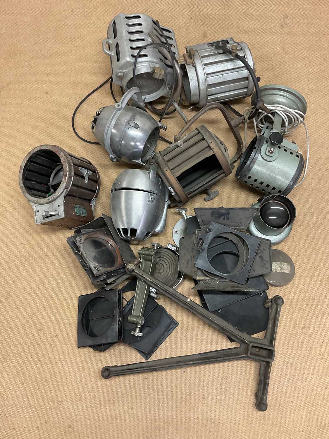 A quantity of mid 20th century film and theatre stage spotlights, all requiring restoration, and