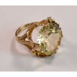 A 9ct yellow gold and citrine dress ring with elborate setting, size H, approx 4.4g.