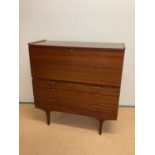 A mid 20th century drop front bureau desk over four drawers, height 112cm, width 110cm, depth 45cm.