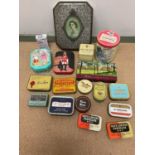 A collection of tins, some vintage, some more modern.