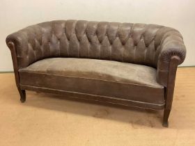 A 1930s Swedish buttonback leather sofa, height 77cm, width 166cm, depth 75cm.