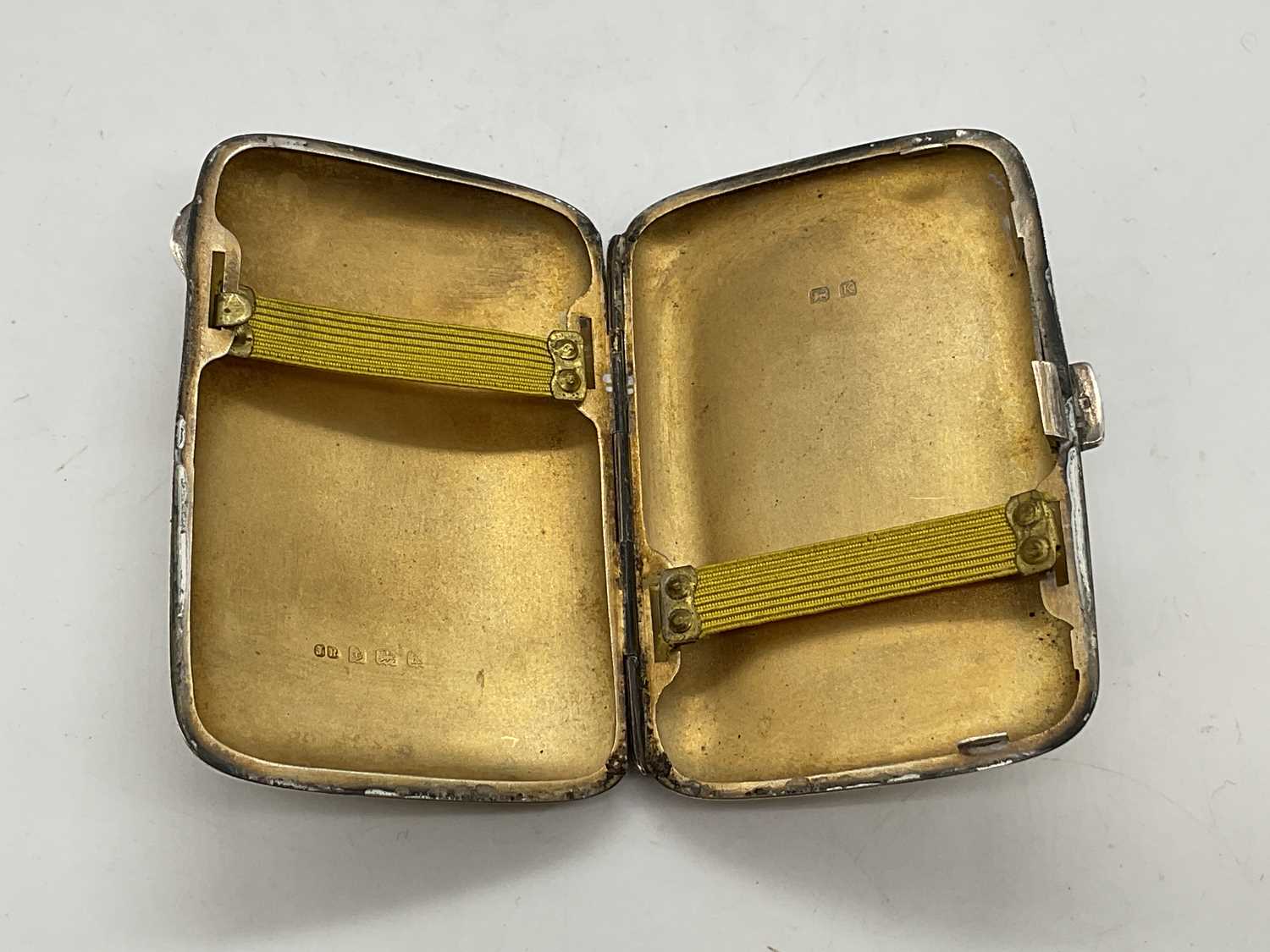 A silver cigarette case, hallmarked Birmingham, 1934, 1.8 ozt, 55.9gm approx, a glass silver - Image 3 of 4