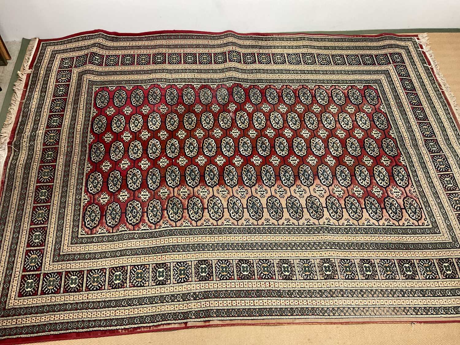 A large rug, 340 x 240cm (af).