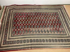 A large rug, 340 x 240cm (af).