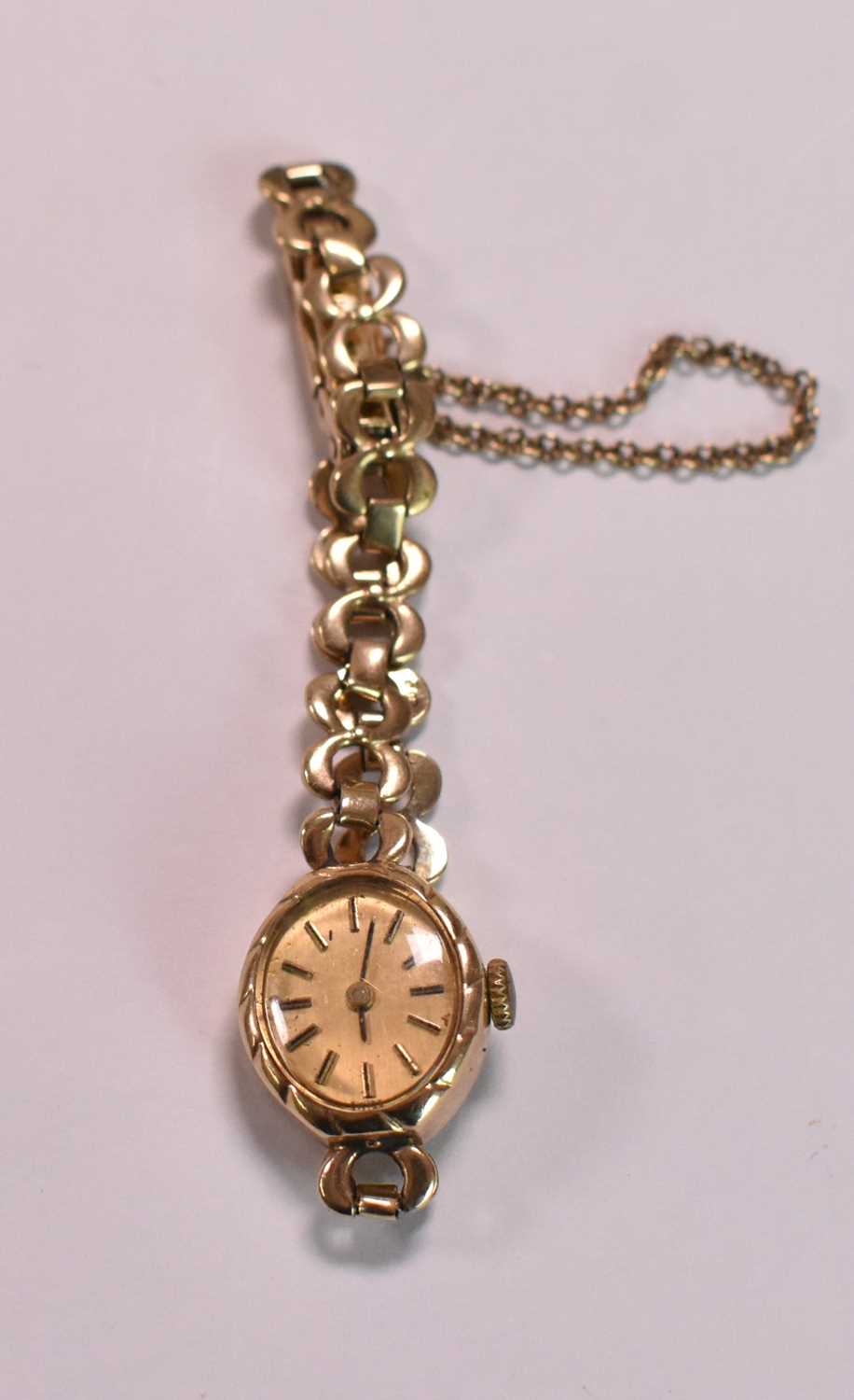 A lady's vintage 9ct yellow gold wristwatch with gold bracelet and baton markers to the oval dial, - Image 4 of 4