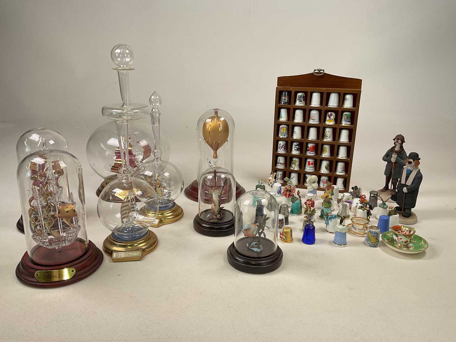 A quantity of collectibles including art glass models of ships including The Golden Lion, The Golden