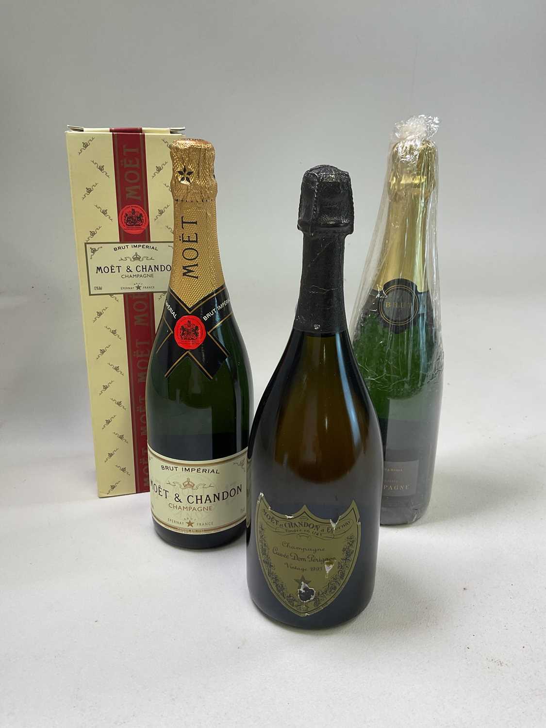 CHAMPAGNE; three bottles comprising Dom Perignon Vintage 1993, Fortnum & Mason Brut Reserve in