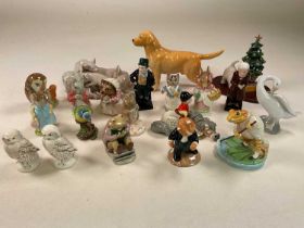 A large group of figures including a Lladrό pig group, a Beswick Norman Thelwell 'Kick-Start'