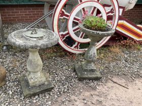A composite stone bird table and sun dial, height approx 67cm.