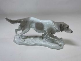 KARL ENS; a large porcelain figure of a dog, painted mark and incised number 2978 to base, length