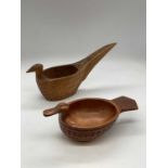 A Scandinavian folk art treen bowl in the form of a duck, length 16.5cm, and a similar Yugoslavian