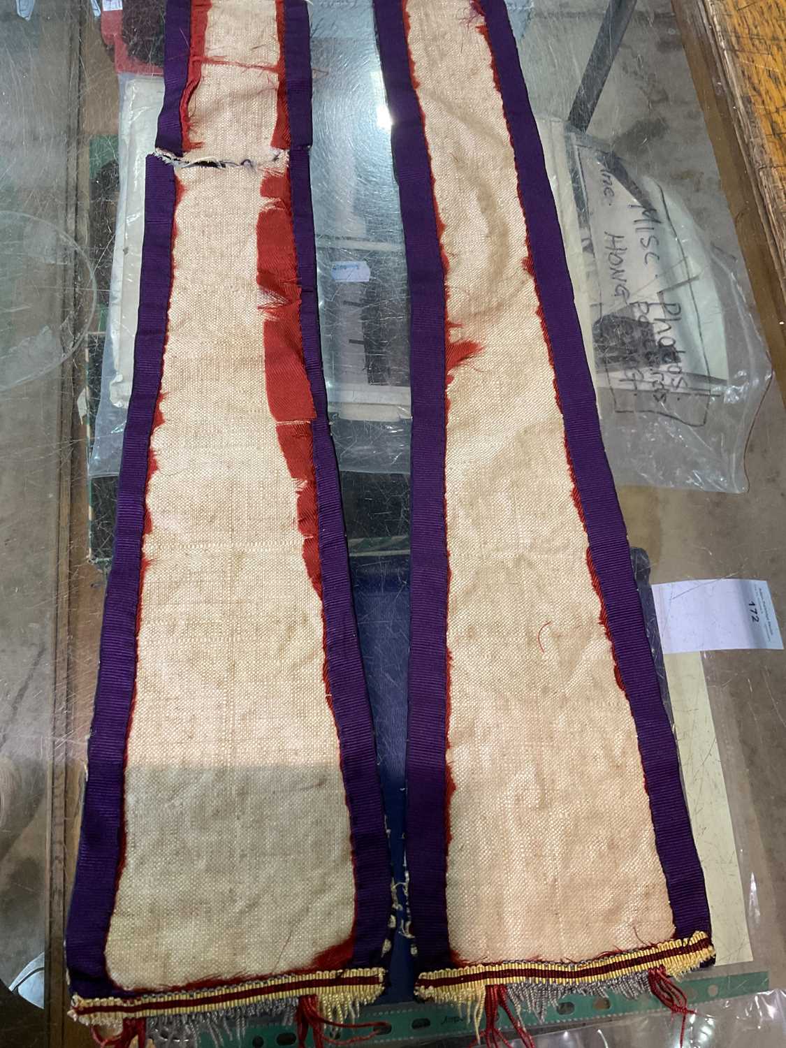 A collectors' lot comprising a quantity of embroidered vestments (af), three violin bows, a crucifix - Image 10 of 22