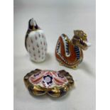 ROYAL CROWN DERBY; three paperweights to include a 'Dragon', a 'Galapagos Penguin', and a 'Crab',