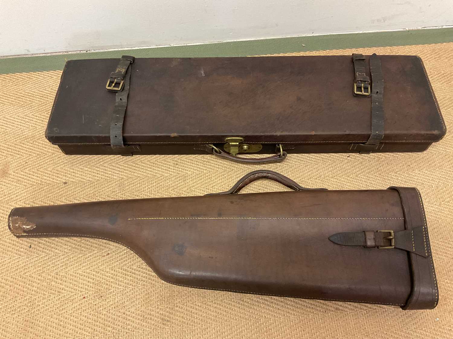 Two gun cases, one leg o'mutton style and one Agnew and Sons