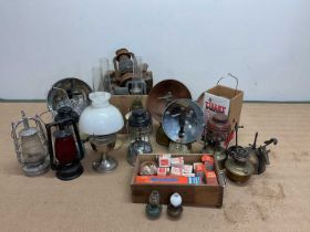 A large collection of Tilley lamps and others, with accessories, (some af)
