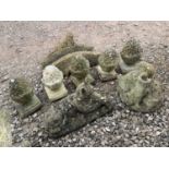 Garden statuary including pin cone finials, animals and a bridge (8)