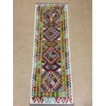 A Chobi Kilim runner, 193 x 65cm.