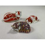 ROYAL CROWN DERBY; three paperweights to include a 'Puppy', exclusive for The Royal Crown Derby