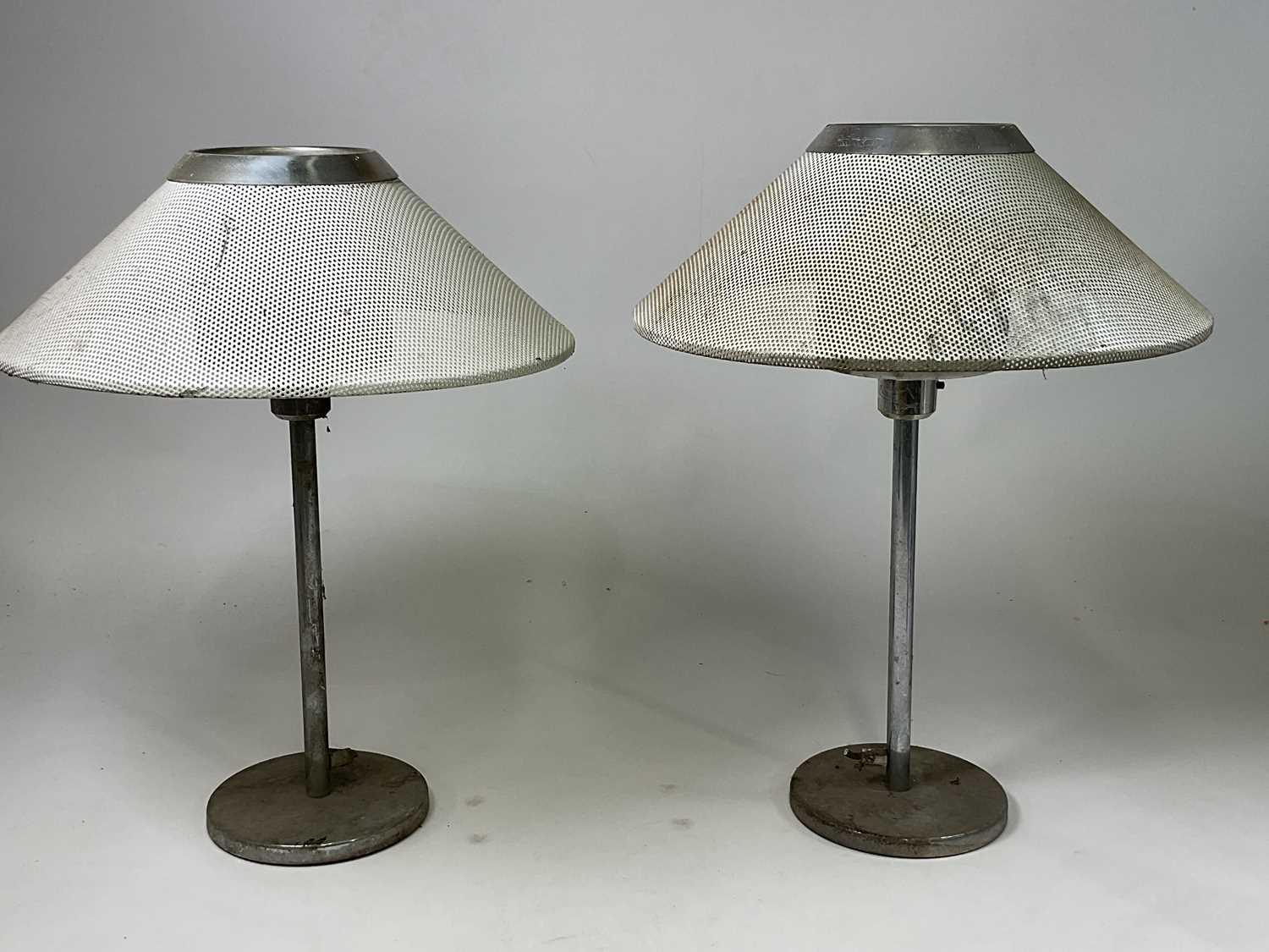 A pair of metal Swedish table lamps with metal mesh shades, height 56cm.