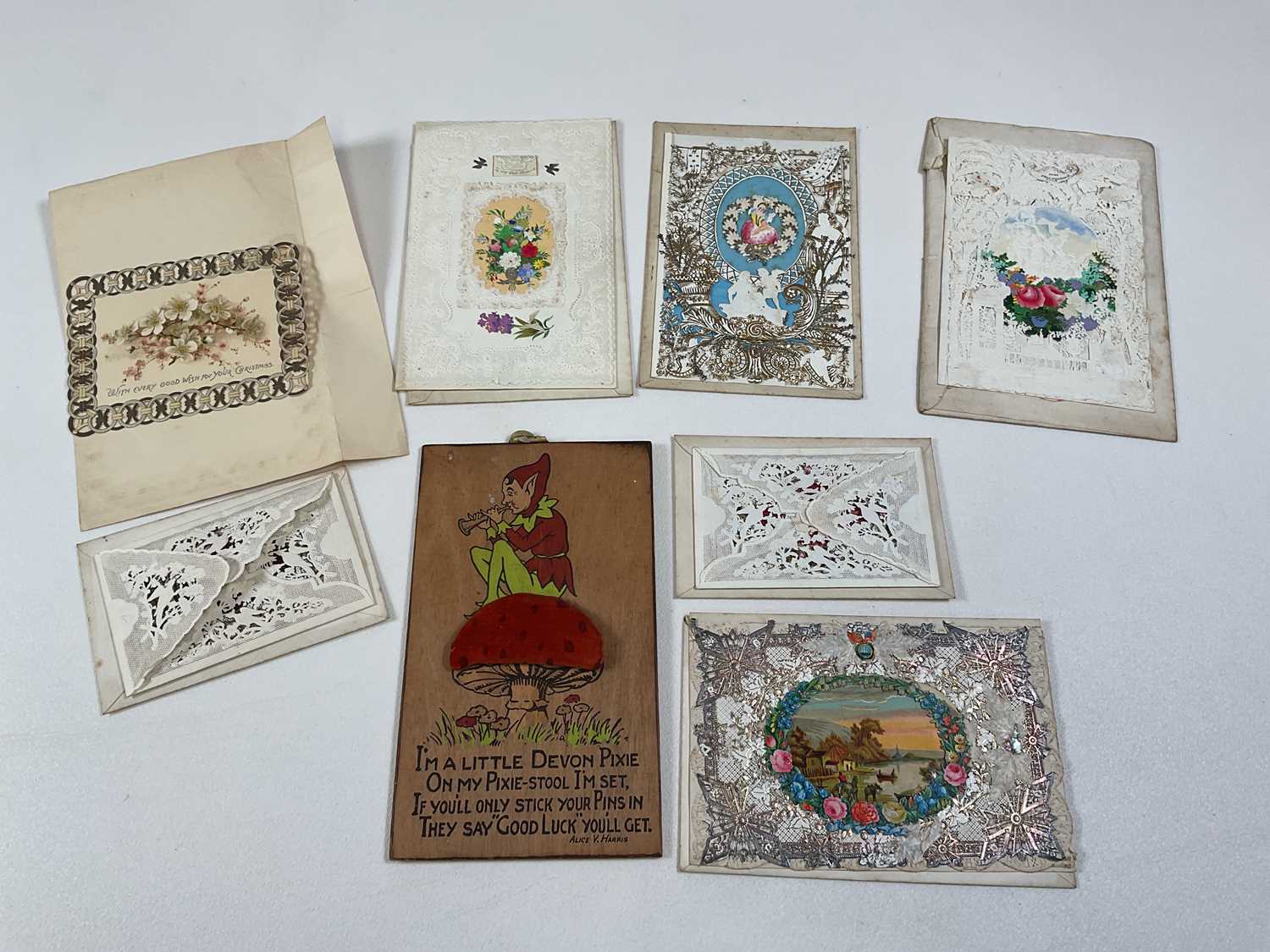 An interesting collection of 19th century Valentines and a pin cushion inscribed 'I'm a little Devon