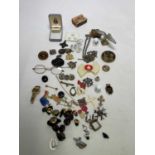 A collection of costume jewellery, buttons, spectacles and other items