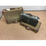 Four military suitcases comprising three canvas Naval style suitcases and one small metal example,