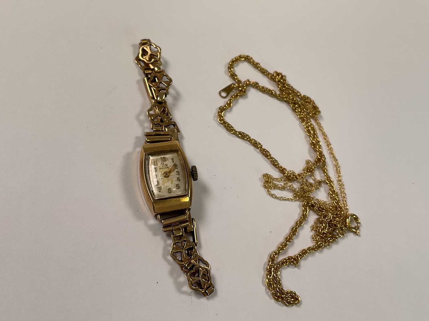 A lady's 9ct gold wristwatch, with hallmarked case and bracelet, total weight approx 11.7g, and