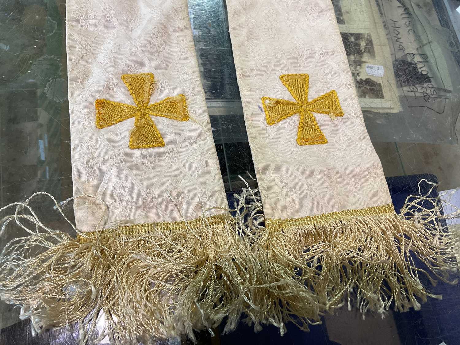 A collectors' lot comprising a quantity of embroidered vestments (af), three violin bows, a crucifix - Image 5 of 22