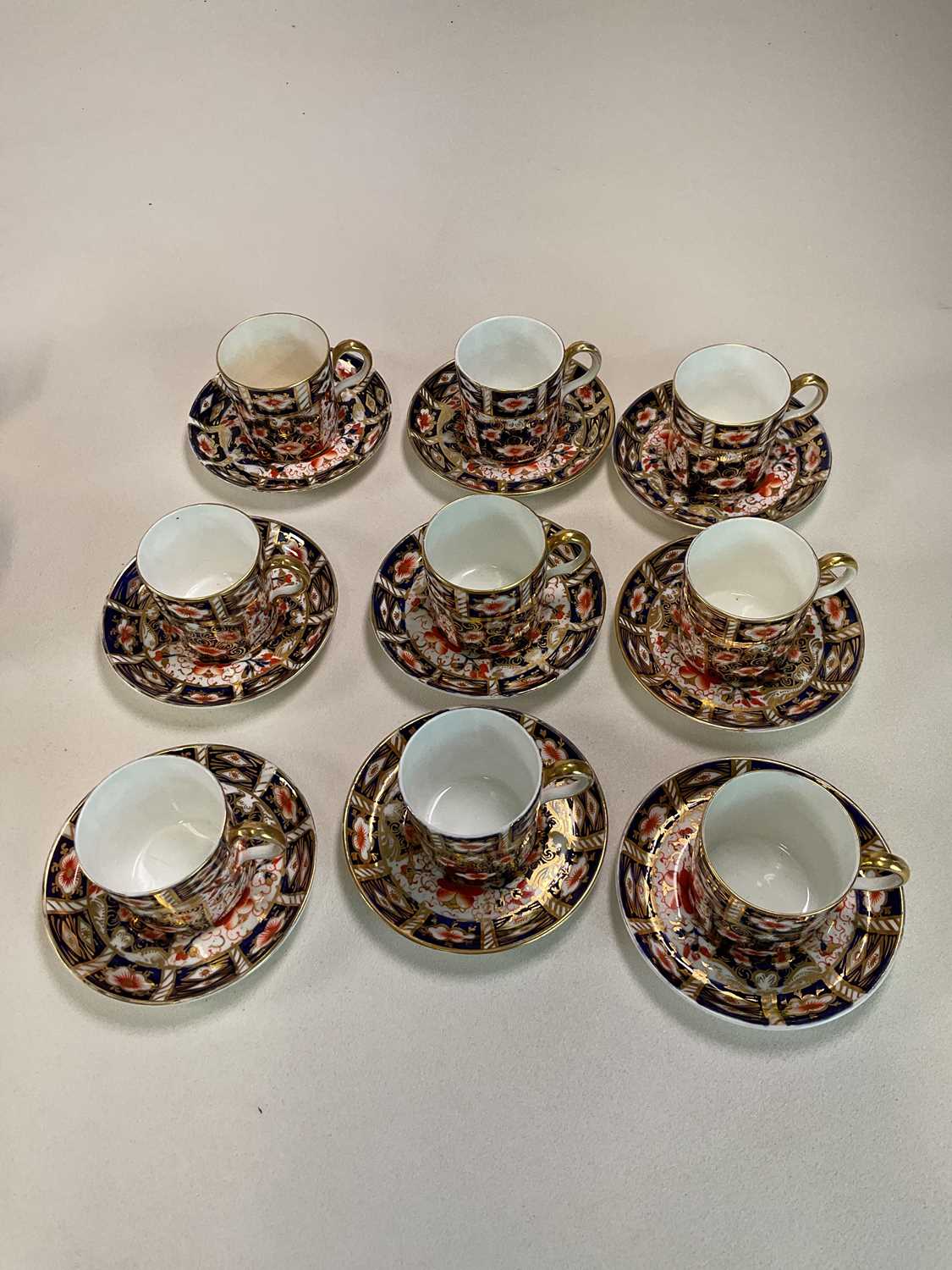 ROYAL CROWN DERBY; a group of Imari decorated wares comprising nine coffee cans and saucers (the - Image 3 of 5