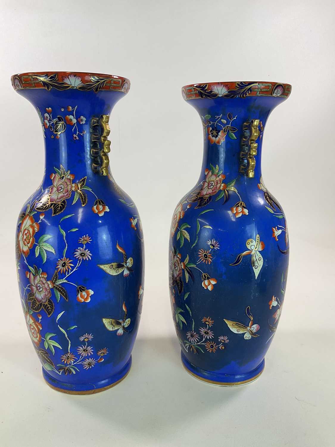 A very large pair of mid 19th century blue ground vases in the Chinoiserie style with stylised - Image 3 of 7