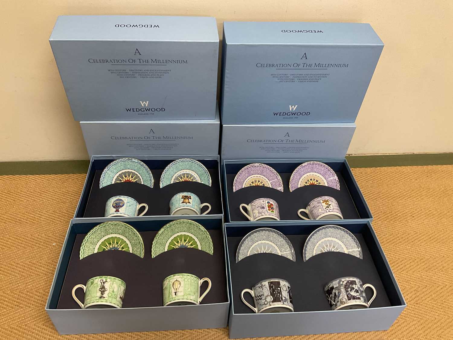 WEDGWOOD; four boxed Celebration of the Millenium cups and saucers sets, comprising 18th Century -