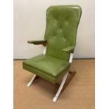 MCKAY; a 1960s American cantilever rocker chair upholstered in green faux leather material, height