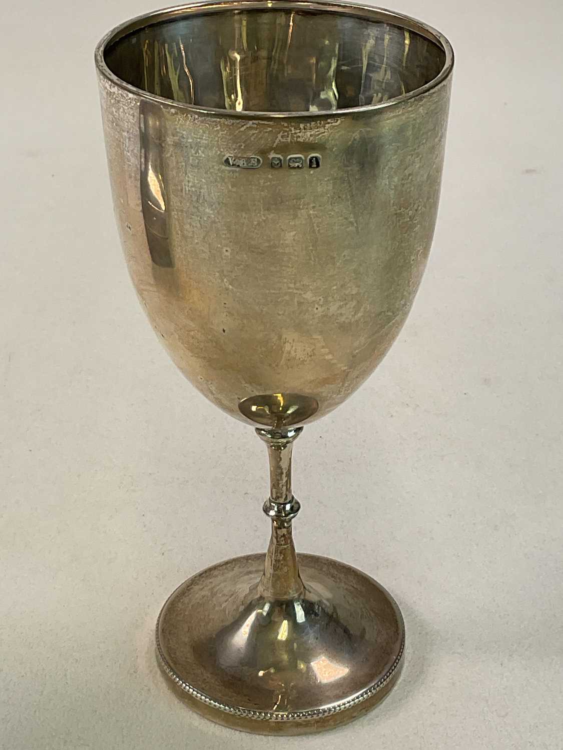 An Edwardian hallmarked silver goblet with applied crossed rowing oars and with armorial - Image 2 of 3