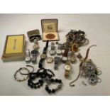 A quantity of costume jewellery including pendants on chains, also a group of vintage gentleman's