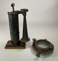 A Tyfon Patent hand operated fog horn, height 59cm, together with a ship's porthole, diameter