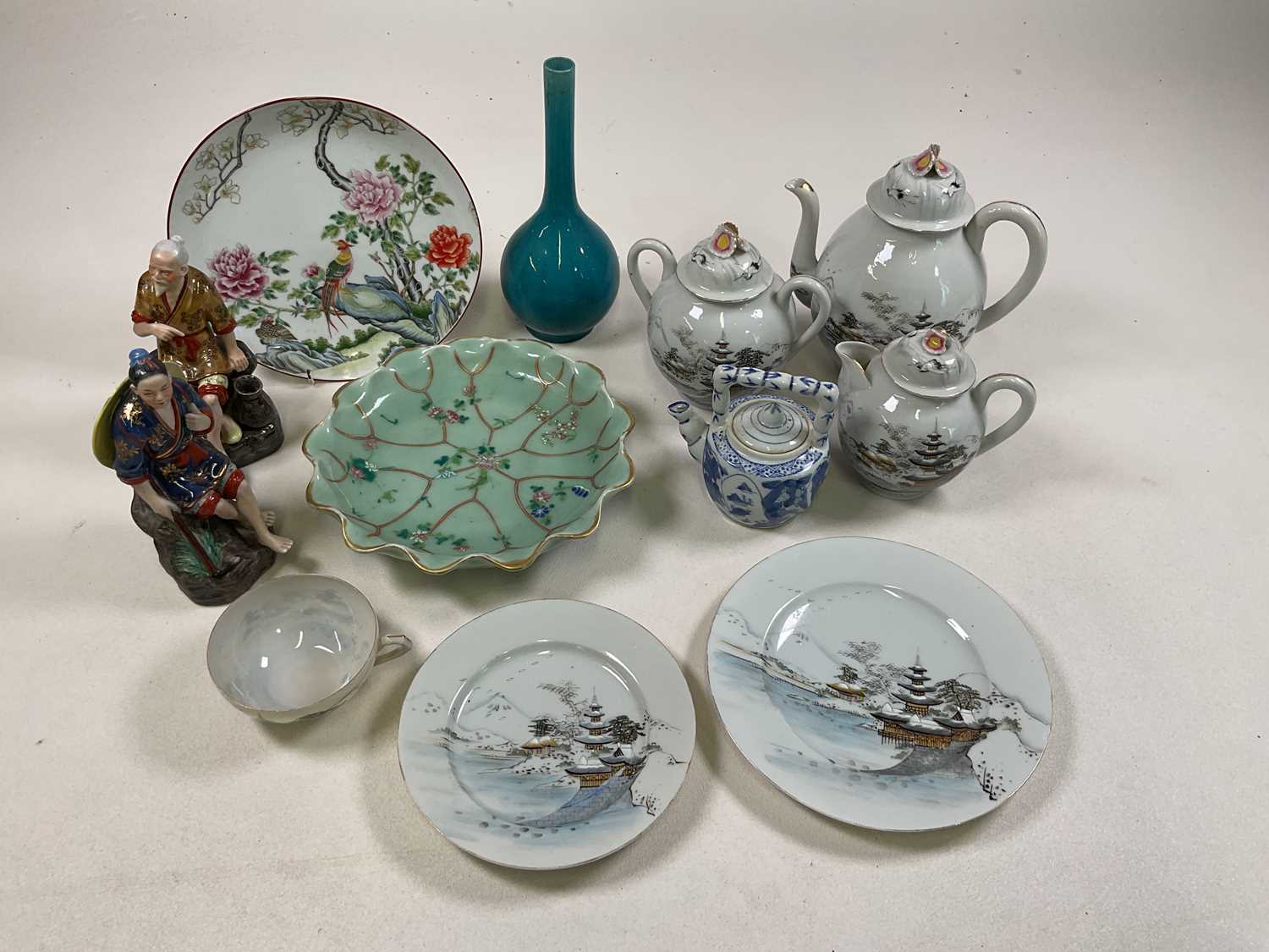 Twelve Oriental ceramic pieces including, figures, teapots, plates etc. Condition Report: Part tea
