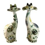 † David Sharp for Rye Cinque Ports pottery; a pair of giant pottery cats with floral decoration,