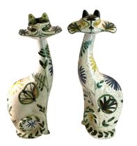 † David Sharp for Rye Cinque Ports pottery; a pair of giant pottery cats with floral decoration,