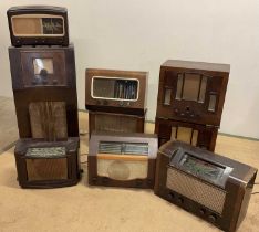 A collection of vintage valve radios including two bakelite, a large HMV and others (9)