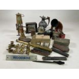 A collectors' lot including a pair of brass Art Nouveau wall mounted candleholders, powder flasks,