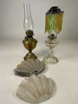Two Art Deco glass wall lights in the form of shells, one with original chrome fitting (af), two oil