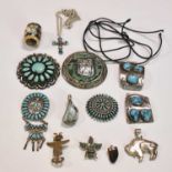 NAVAJO/NATIVE AMERICAN; a group of white metal jewellery including a floral turquoise set brooch
