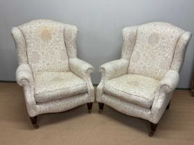 Two cream upholstered arm chairs, height 92cm, width 82cm. Condition Report: These are reproductions