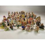 ROYAL DOULTON BUNNYKINS; a huge collection of approximately eighty figures. Condition Report: At the