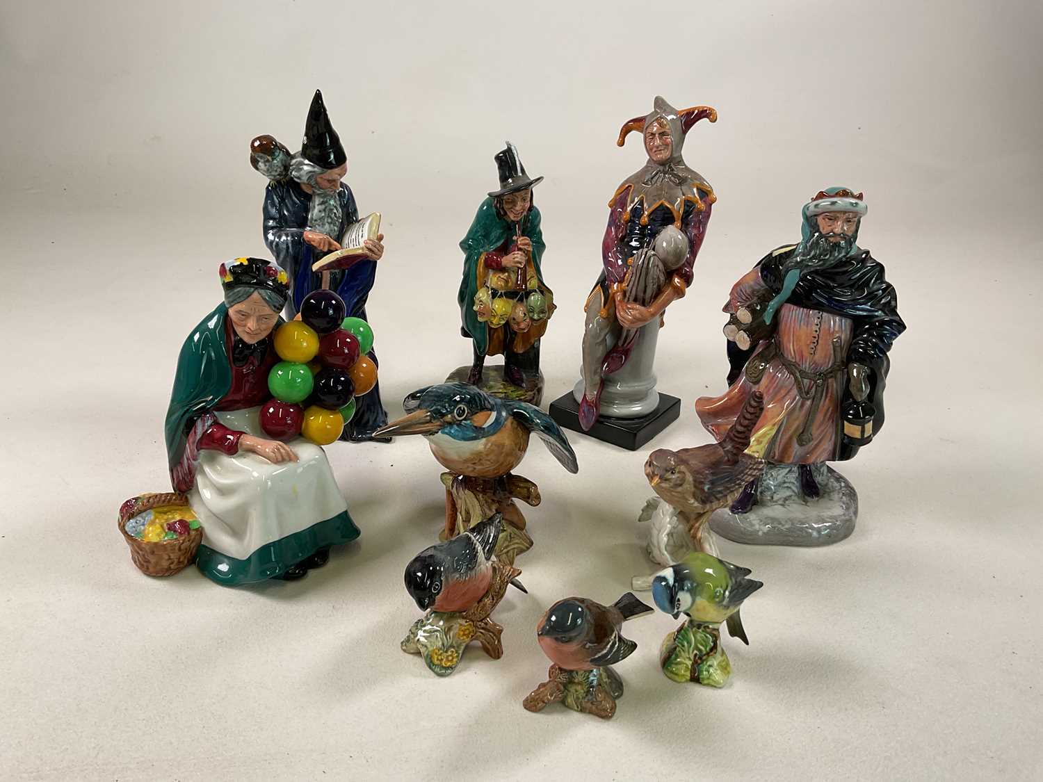 ROYAL DOULTON AND BESWICK; five Doulton figures comprising 'The Old Balloon Seller' HN 1315, 'Good