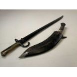 A French chassepot bayonnet, length 71cm and a Gurkha's kukri knife with horn handle, length 43cm (