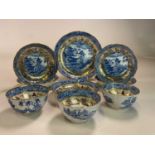 A group of circa 1800 English blue and white 'Willow' pattern, later clobbered with gilt