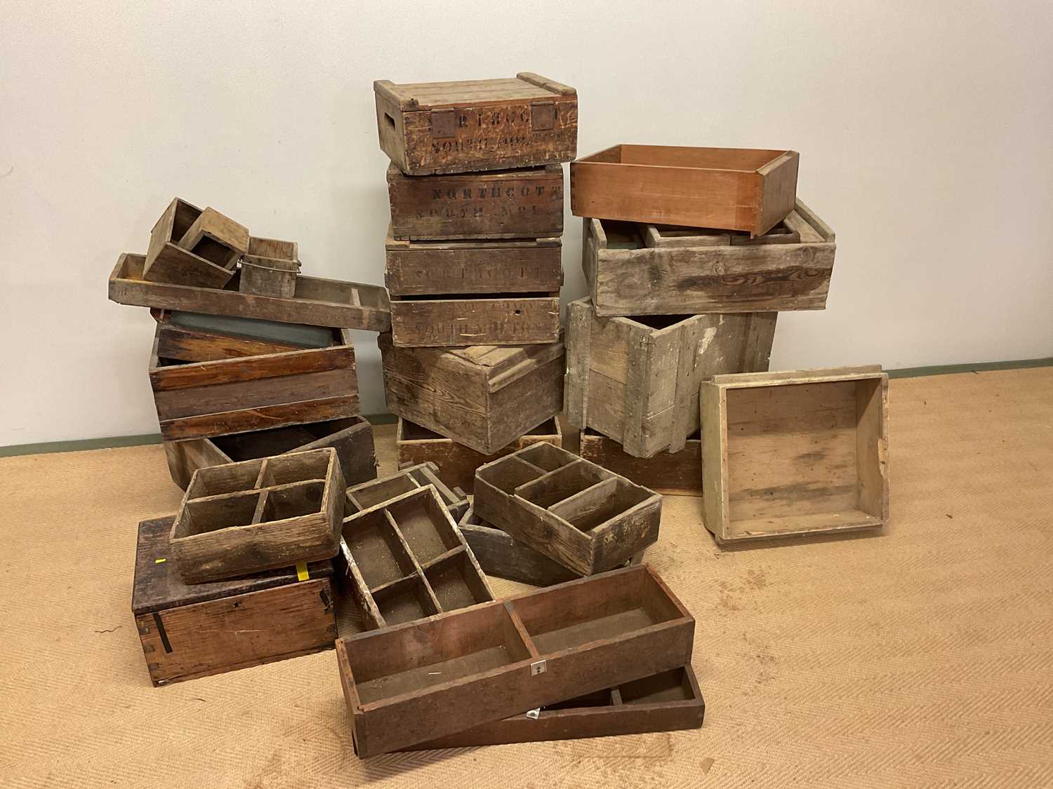 A very large quantity of vintage wooden crates and boxes