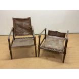 A pair of mid 20th century safari chairs constructed of leather and stained beech. Condition Report: