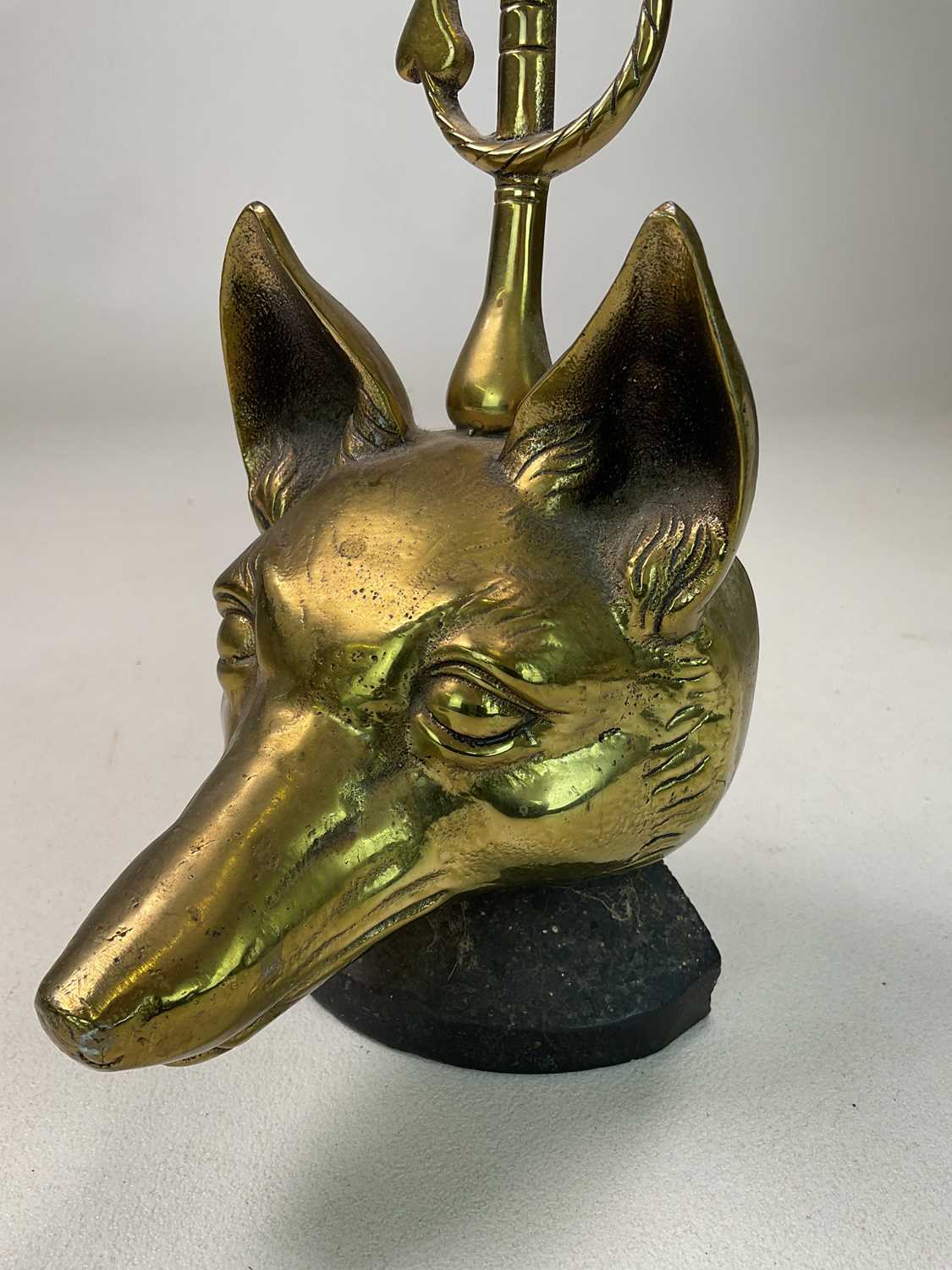 A brass and iron early 20th century doorstop on weighted base modelled as a fox head and whip with - Image 5 of 5